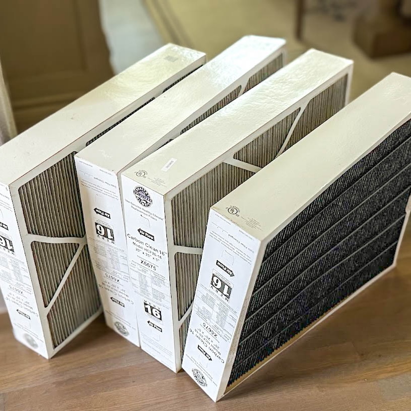 Stack of clean pleated HVAC air filters ready to ship
